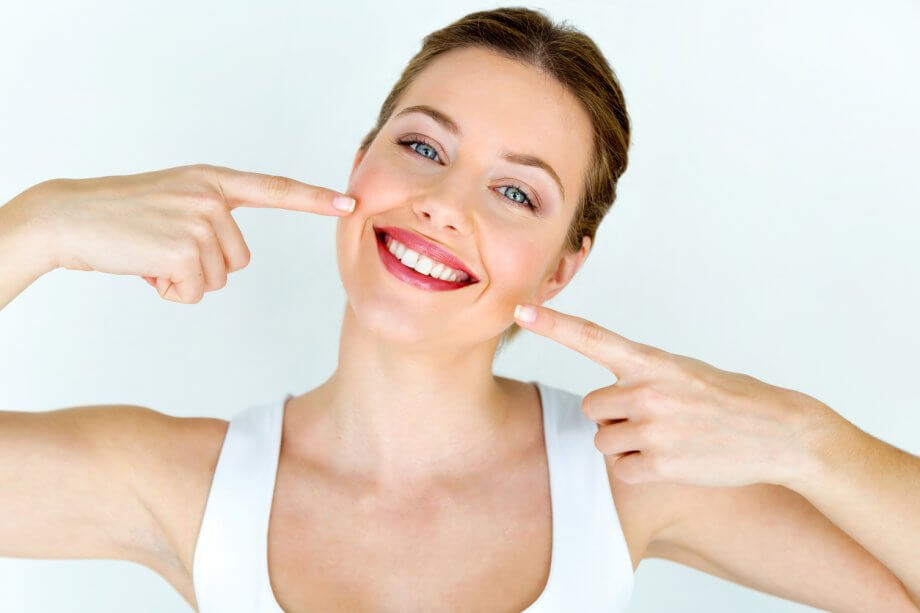 Woman With Beautiful Smile After Full Mouth Reconstruction