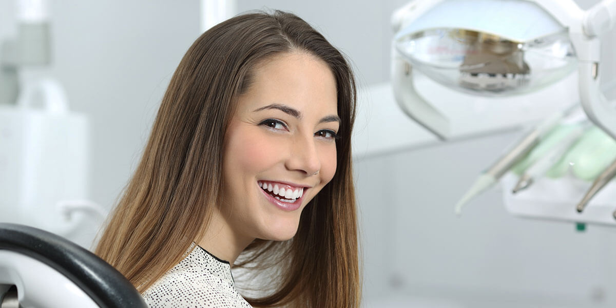 Woman in Dental Chair Smiling